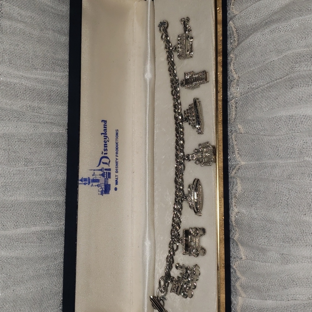 Dapper Day Dream! 1950/60s Disneyland charm bracelet in original box.